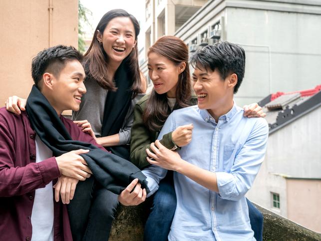 Students laugh together