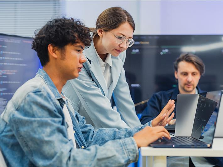 Students working on computer simulation