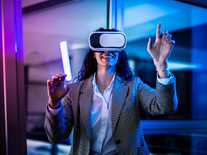 Young woman wearing virtual reality headset