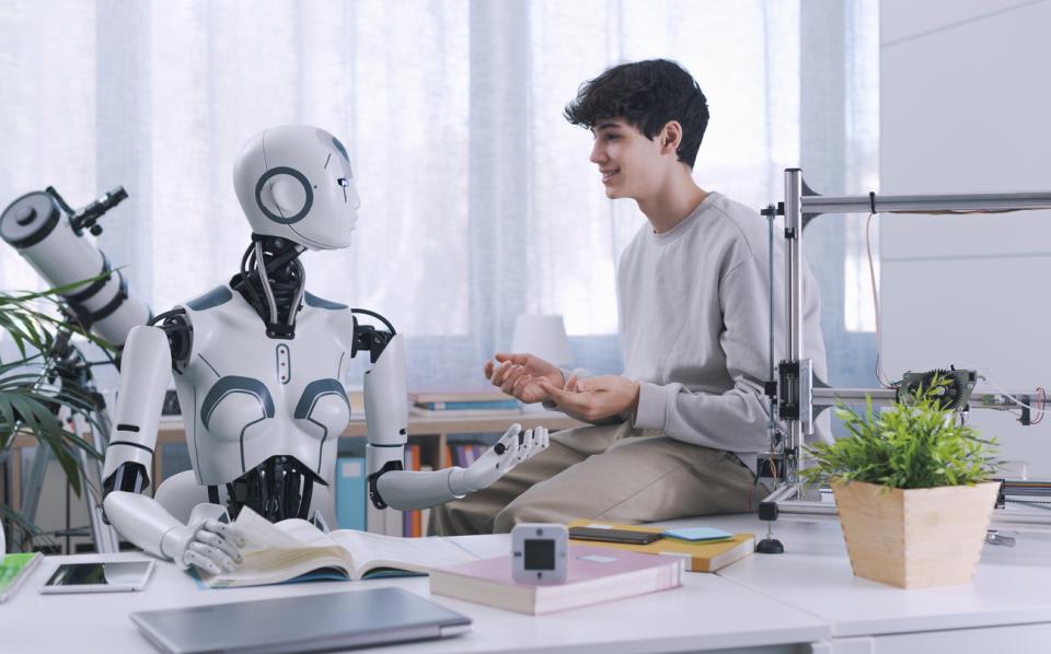 A robot speaking to a student 
