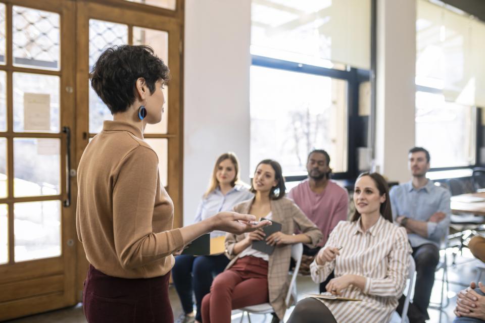 A female professor presenting to class
