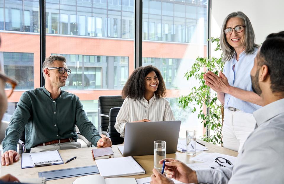 A team of professionals brainstorming in an office