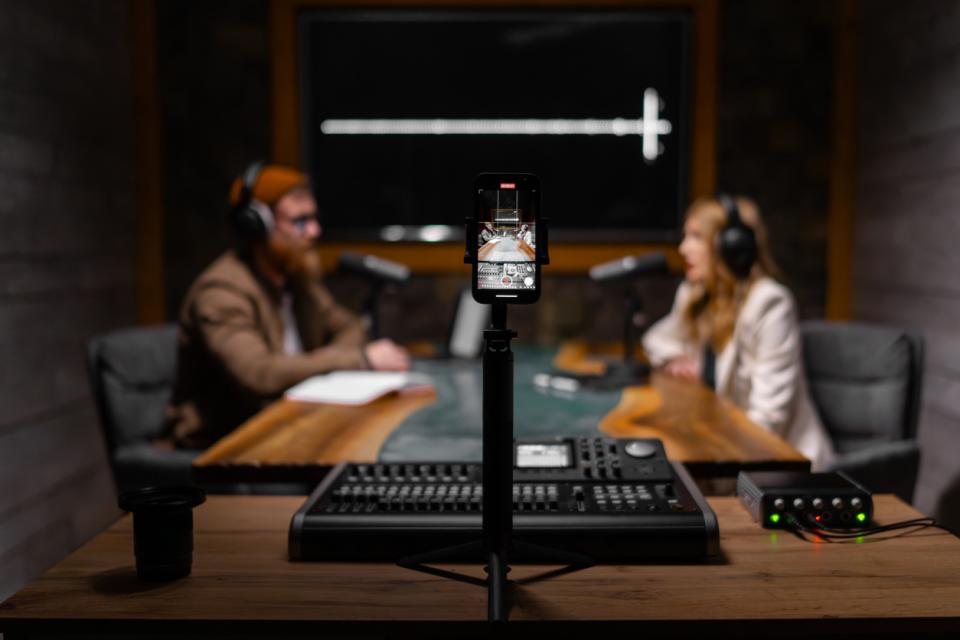 A researcher being interviewed for a podcast