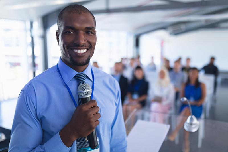 Black man giving presentation