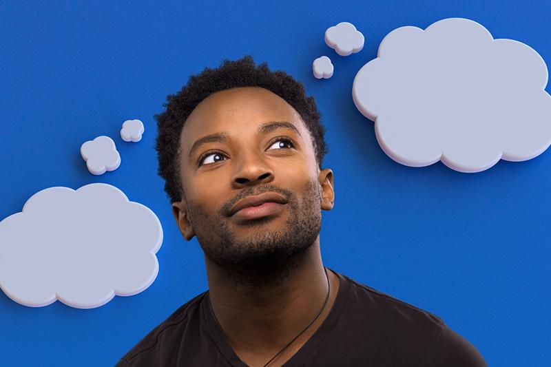Young Black man with thought bubbles
