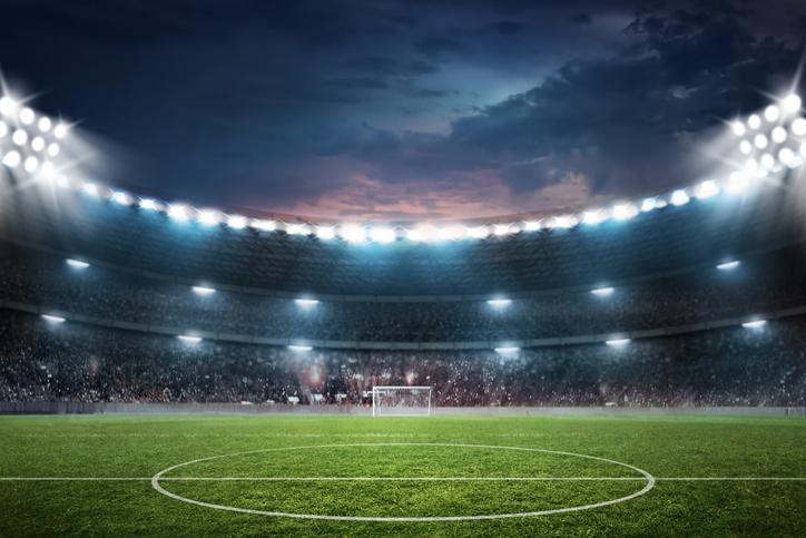 An empty football stadium at night