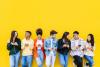 Generation Z students against yellow background